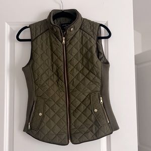 Olive Green small women’s puffer vest with gold accents